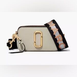 Marc Jacobs Light Gray Snapshot Crossbody with Black/silver/Pink Branded Strap.